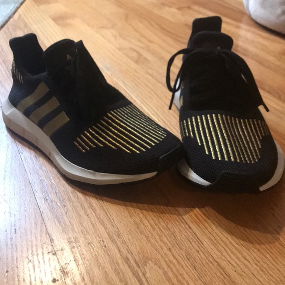 black and gold adidas tennis shoes